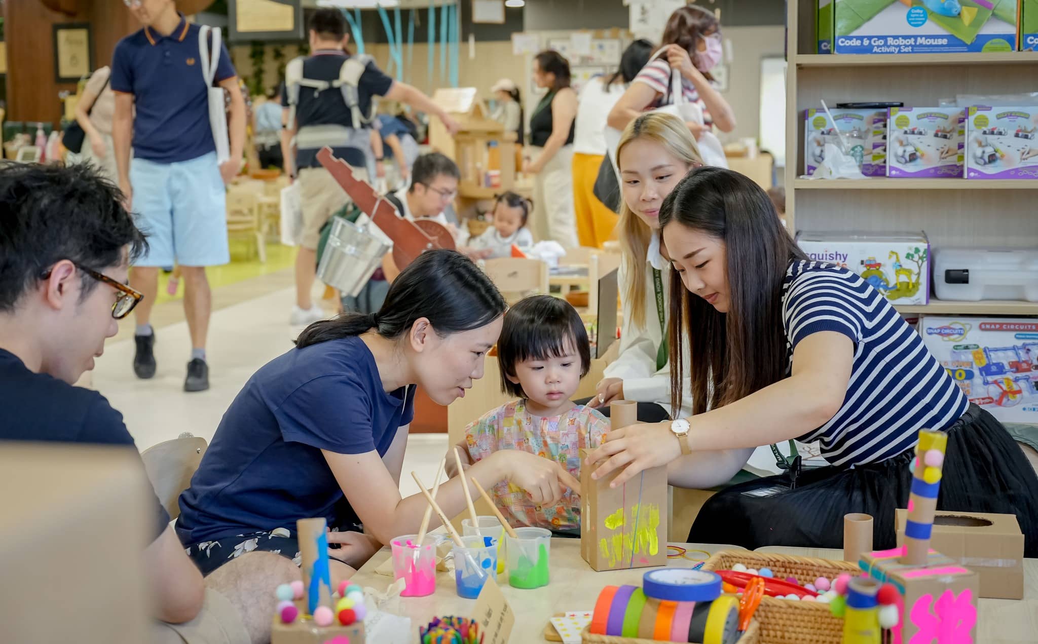 parents, children, and teachers on a malvern college pre-school hong kong campus